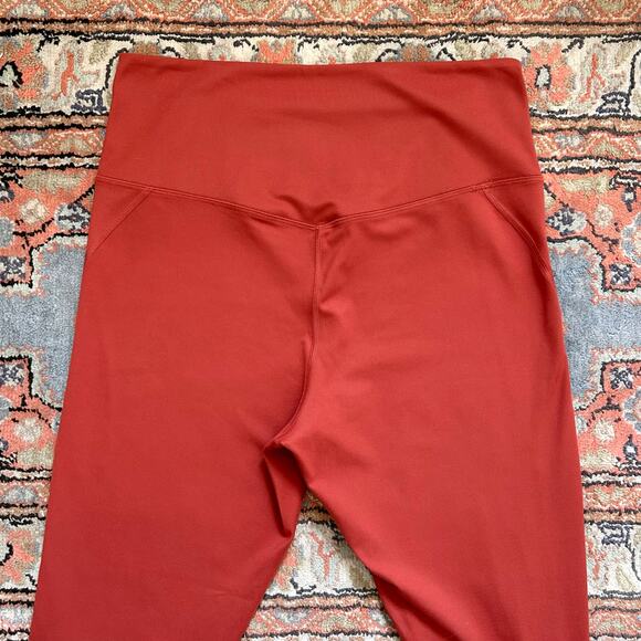 Girlfriend Collective Rust Orange High-Waisted Leggings - Picture 3 of 5